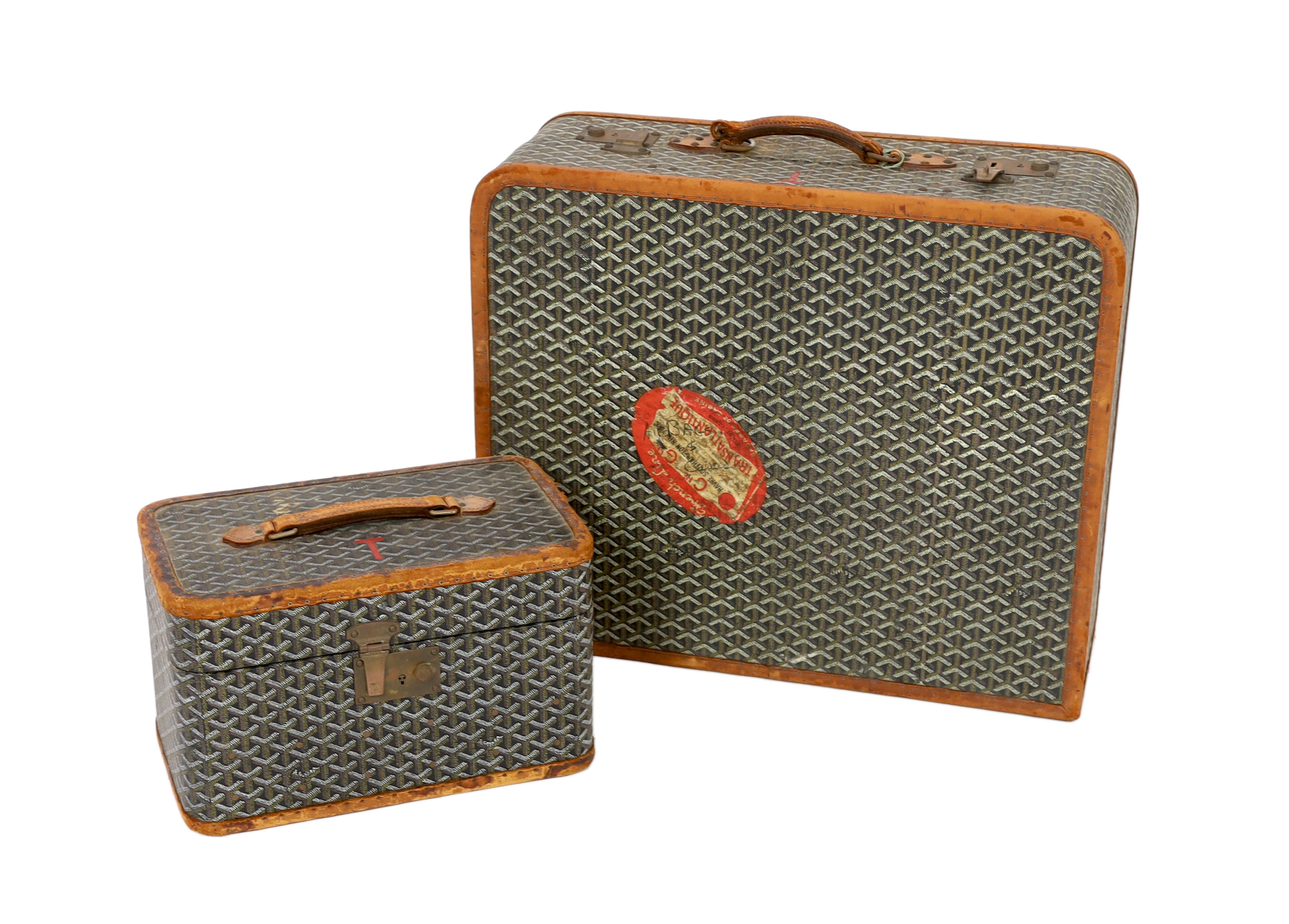 A 1940's Goyard vanity case with matching suitcase, vanity case width 37cm, depth 23cm, height 23cm; suitcase width 59cm, depth 21cm, height 50cm high